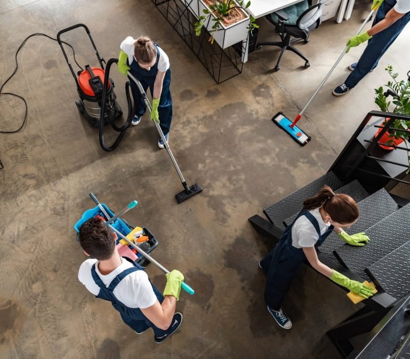 top-view-of-cleaning-company-team-cleaning-modern-office.jpg